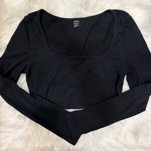 Black cropped long sleeve top